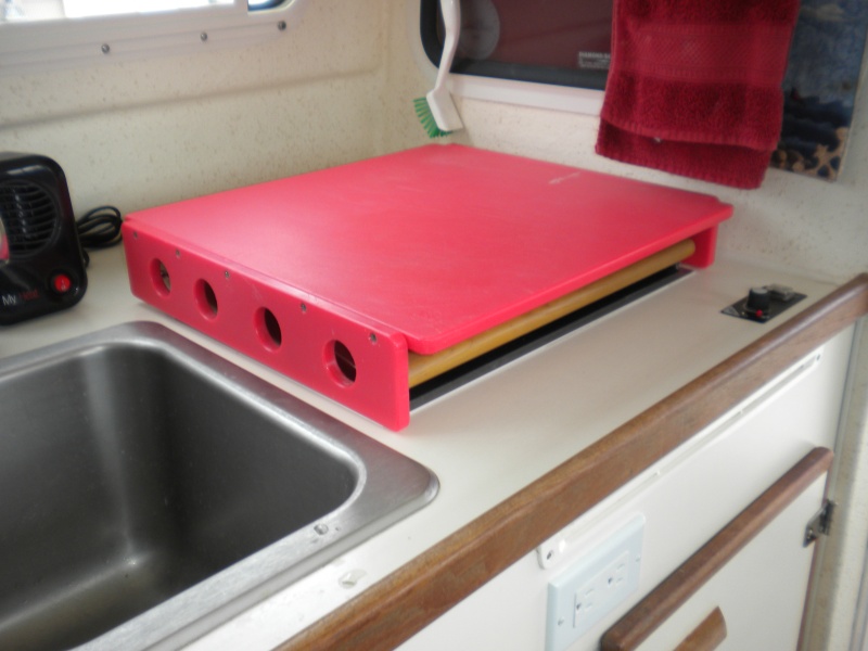 New design cutting board allows the stove to heat boat with cutting board in place.