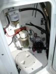 Raw water wash down pump and filter installed in Port Lazarette hatch.