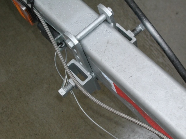 Equal-i-zer hitch brackets, welded in position.