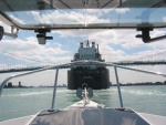 (C-batical) Approaching the stern of a 1000 foot freighter heading down the Detroit River.