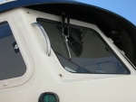 Safety grab handles and Pantographic wiper arms added. Handles are easily reached from inside the cabin for fender applications.