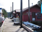The floating building contains a fire boat , community hall, and post office.  The dock is a free Alaska state float.