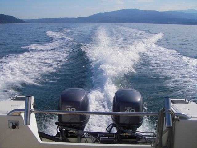 Flat but not glassy day, twin 40's, headed out of Sequim Bay, with 