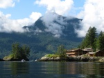 Malibou Lodge at the entrance to Princes Louisa Inlet.  Boat entering the Rapids on an ebbing flow.