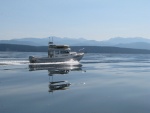 JC Lately on a glass flat Juan de Fuca. Some days are like this, but some are not.  One of my favorite C-Dory pix.  I'm a fan of a good monotone sometimes.