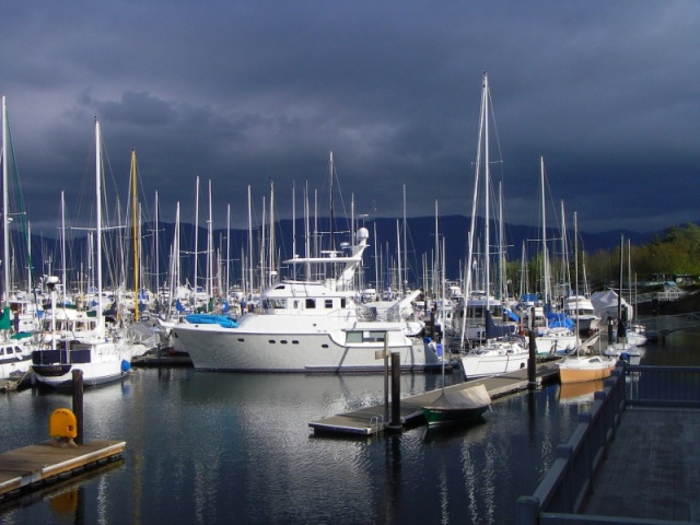 White boat and dark sky, John Wayne Marina