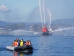 Free rides in the fastboats, but not fast enough to dodge the fire boat spray.  Victoria Navy days.