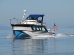 Seen at John Wayne and off Protection Island, Strait of Juan de Fuca.  An interesting design.  Roomy.  Only saw this boat one time.  Built in the Netherlands, for big water, if I remember right.  Would like to know more about it.