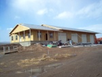 Garage doors,  and roofing metal started.