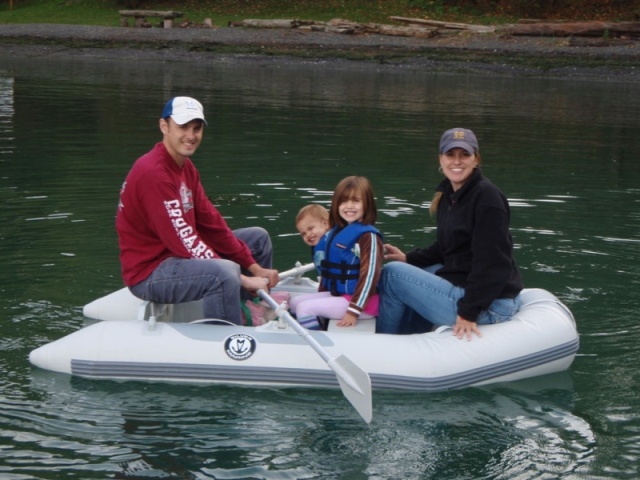 Rowing to shore at Inati Bay.  The whole family fits!!!