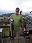 Petersburg Creek 2010 220 - Visitor (with Coho caught on 20 minute skiff trip) and gracious host (who hadn't been so lucky).