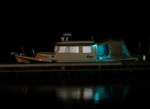 Tucked-in-at-Goosepond. The green led rope lights portray a ghostly image. We usually have this marina to ourselves at night.