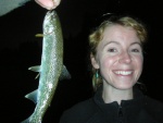 anna with a nice trout camping in Forks, WA, Sept 2009