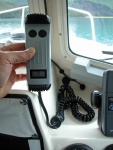 (AnchortownJim) Windless control in my hand.  The cord is long enough when passed through the open front window for me to operate it from the bow.  It also has a built in line out counter.  Very handy to know how much rode is out.