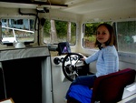 Anna at the helm of the Anna Leigh