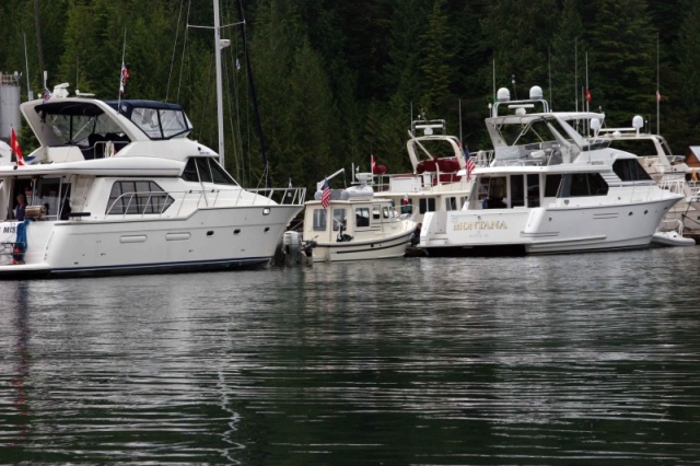 Kingfisher II between Bayliner 57 and WestBay Son Ship 58.