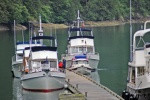 Playing with the big boats at Chatterbox Falls, Princess Louisa Inlet