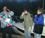 (Pat Anderson) Rev Jim christening boat-y-sattva - take a sip!