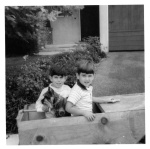 My first boat 1965 (I'm on the right).  Yes, it floated... sort of.