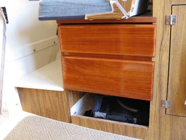 Two new drawers.  Mahogany fronts.  Pico chair (folding chair in a bag) stowed underneath.