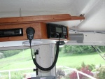 Shelf secured to offset added weight of Teak console for radios.