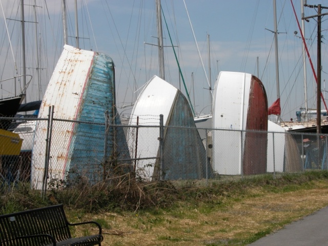 This old boatyard has since been removed. It layed east of the reclaimed wetland turned into a park.