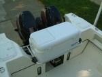 Large Igloo cooler and stainless steel rack in engine well