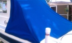 rear mooring cover keeps boat clean and dry