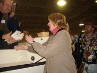 tluck_Factory_Party_Tom_Latham_giving_Amy_T_shirts.jpg