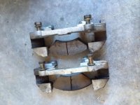 Part_of_disk_brakes_bolted_to_suspension.jpg