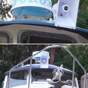 Hailer mounted to eye brow with SS bolts in lip, no roof holes.