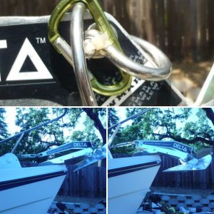 Close Fit. New Delta 14 Fast set just clears (old Bruce 11 had plenty of room)as the auto launch drops. Note second shackle at top of anchor allows simple clip to top of roller bar for trailering security. Stainless shackle and SS swivel also just fit in front of windlass even at full tension. Shackle\swivel combo eliminates most of the possibility of side loading on the swivel (I think).