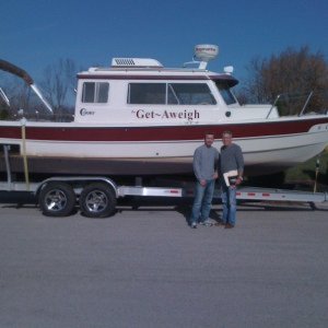 Marc and his son Landon prepare to take the Get~Aweigh to her new home in Northern Alabama.