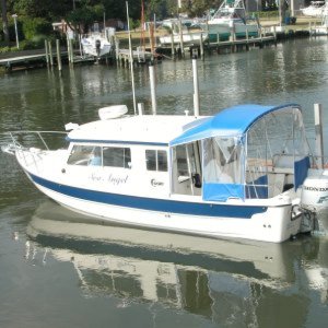 Sea Angel with camper back;
even at 6'2" I fit under it.
(SOLD  23 Jan 2015)