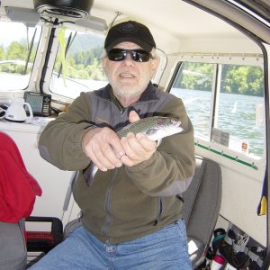 Media 'Dan catches a fish' in album 'Detroit Lake'