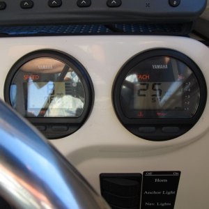 Media 'gauges' in album 'M-Y Wedge slipped out of place and deformed, not sure why (did work fine for a different 3,000-mile tow).  This allowed the motor to come down somewhat, but luckily not all the way as it "wedged" between the tilt cylinder and the transom.'