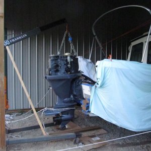 Engine hoisted up to do a multi-part project.  1) overdrill/epoxy fill/re-drill mounting holes; 2) Raise engine by two holes (1-1/2"); 3) Add wedges for 5? more tuck (probably); 4)Add aluminum "bar" across between upper mounts on inside of transom (like big washer); 5) Add larger washers on inside of lower holes; 6) Replace stainless coarse-thread fasteners with better grade coated, fine-thread fasteners; 7) Replace silicone (groan) with proper sealant.