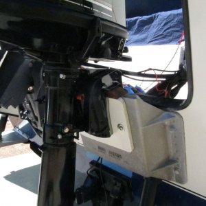 Media '' in album 'M-Y Wedge slipped out of place and deformed, not sure why (did work fine for a different 3,000-mile tow).  This allowed the motor to come down somewhat, but luckily not all the way as it "wedged" between the tilt cylinder and the transom.'