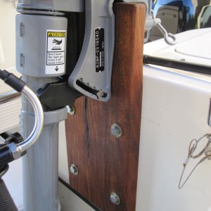 Media 'Used a piece of 4 quarter teak. Bolted to port lazarette. These bolts were later replaced with SS carriage bolts.' in album 'West Marine RU3 fits just right.'