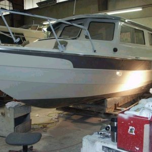 Port bow area. Note rails and cleats are now installed.  3/15/04