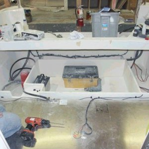 Fuel tank and fish box area (box is 31" by 58", store your Tuna, Salmon, Halibut, below deck).  Box will have split hinged lid and a macerator pump- out. This was my idea and Les and Cam made it happen. Thanks again Les & Cam. Areas to the side of the box are for storage and trim tab access. 3/15/04