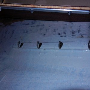I put rows of hooks for various things on both sides