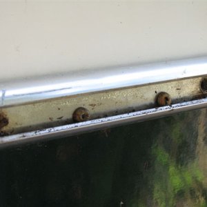 006 6
End caps laying in aluminum rail track...I am not sure where the rust came from