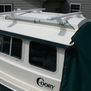 Fir kayak rack lashed on - I think this is C-Dory Grace.