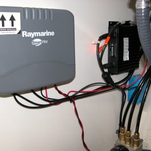 Media '(Sea Angel) S1G, Autopilot CPU located under the sink.
The black box to the right is the GARMIN "GSD-20" transducer module.
The hydraulic pump for the autopilot can be seen at the bottom right of the pix.' in album '(Sea Angel) ST6001 Autopilot hydraulic pump located under the sink. There is minimal noise heard from this location.'