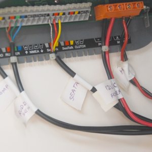 Media 'Sea Angel's SmartPilot wiring. Notice all the terminals are color coded with the appropriate cables; except, the BiDirectional Hydrolic Pump. Its terminal is labeled "A" & "B".  Beware of the leads position if you should have to remove them. This hookup has the Red wire to the "A" Terminal.' in album '(Sea Angel) ST6001 Autopilot hydraulic pump located under the sink. There is minimal noise heard from this location.'