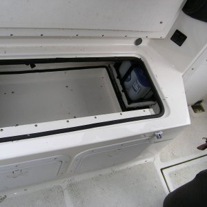 Optima starting batteries moved outboard to free up storage. Batteries are sealed, hence no need for room to add water.