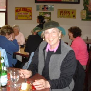Robbin (ANITA MARIE) 
shares her cheesecake 
with the photographer