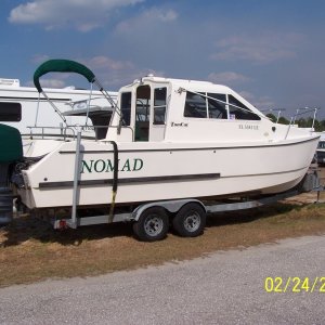 This is our 5th big boat.  We looked for over 4 years for this boat.  This is her sitting in the storage yard.  We wanted a trailerable, smaller, more economical, more livable boat.  And this was it for us.