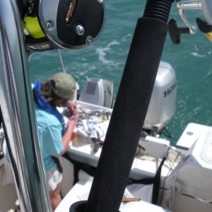 Marcia preparing bait and tackle.